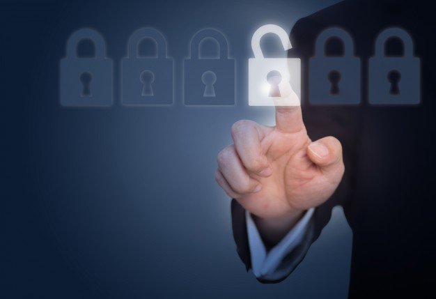 businessman-unlocking-lock-touch-screen_1112-494